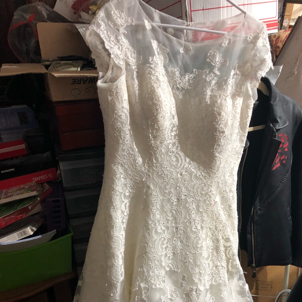 Oleg Cassini Wedding Dress-  499 $250 or $200 w/offer